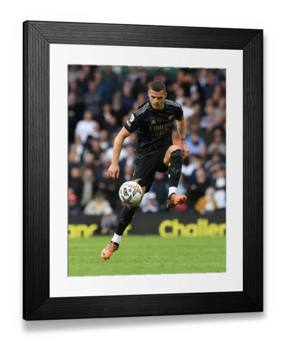 Framed Print : Granit Xhaka: Arsenal's Midfield Maestro Shines in Premier League Clash Against Leeds United