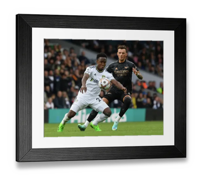Framed Print : Arsenal's Ben White Closes Down Luis Sinisterra in Intense Leeds United vs Arsenal Clash (Premier League 2022-23) Framed Print : Arsenal's Ben White Closes Down Luis Sinisterra in Intense Leeds United vs Arsenal Clash (Premier League 2022-23)