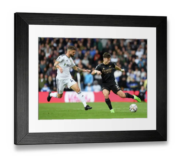 Framed Print : Clash of Styles: Kieran Tierney vs. Mateusz Klich - Leeds United vs. Arsenal FC, Premier League 2022-23 Framed Print : Clash of Styles: Kieran Tierney vs. Mateusz Klich - Leeds United vs. Arsenal FC, Premier League 2022-23