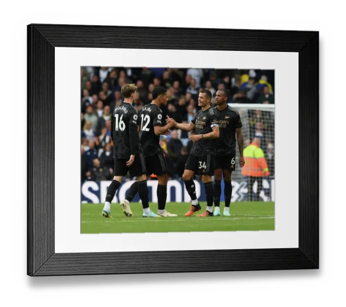 Framed Print : Xhaka and Saliba Celebrate Arsenal's Victory over Leeds United Framed Print : Xhaka and Saliba Celebrate Arsenal's Victory over Leeds United
