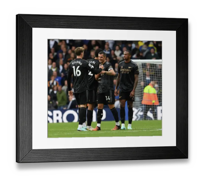 Framed Print : Xhaka and Holding's Reaction: Leeds United vs Arsenal FC, Premier League 2022-23