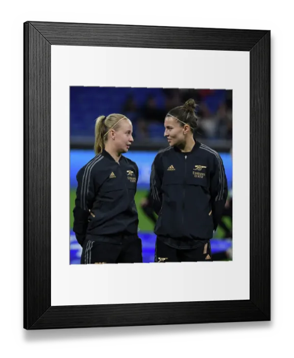 Framed Print : Arsenal Women Face Off Against Olympique Lyonnais in UEFA Champions League Clash