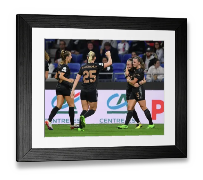 Framed Print : Arsenal Women's Team Celebrates Goals Against Olympique Lyonnais in UEFA Womens Champions League