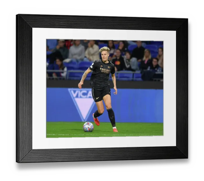 Framed Print : Arsenal Women vs. Olympique Lyonnais: A Champions League Showdown at Groupama Stadium
