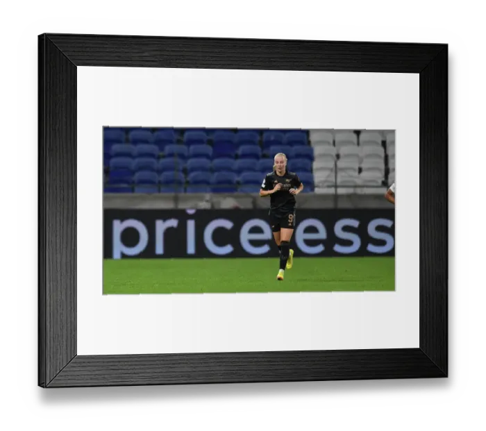 Framed Print : Champions League Showdown: Beth Mead Stars in Olympique Lyonnais vs. Arsenal Women