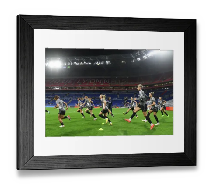 Framed Print : Arsenal Women Take on Olympique Lyonnais in UEFA Champions League Clash