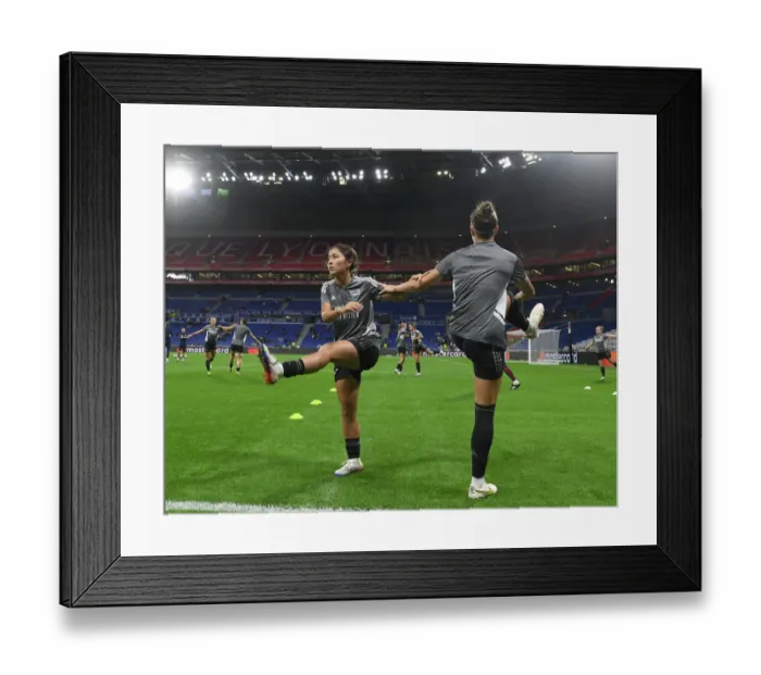 Framed Print : Arsenal Women Battle Olympique Lyonnais in UEFA Champions League Clash