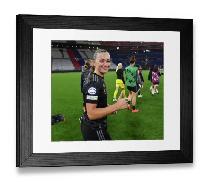 Framed Print : Champions League Showdown: Arsenal Women vs. Olympique Lyonnais - A Clash of Titans
