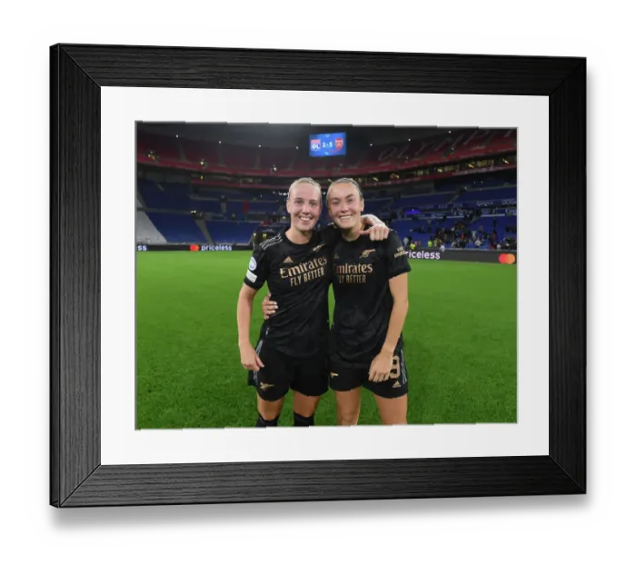 Framed Print : Arsenal Women Celebrate Victory Over Olympique Lyonnais in UEFA Champions League Group Stage