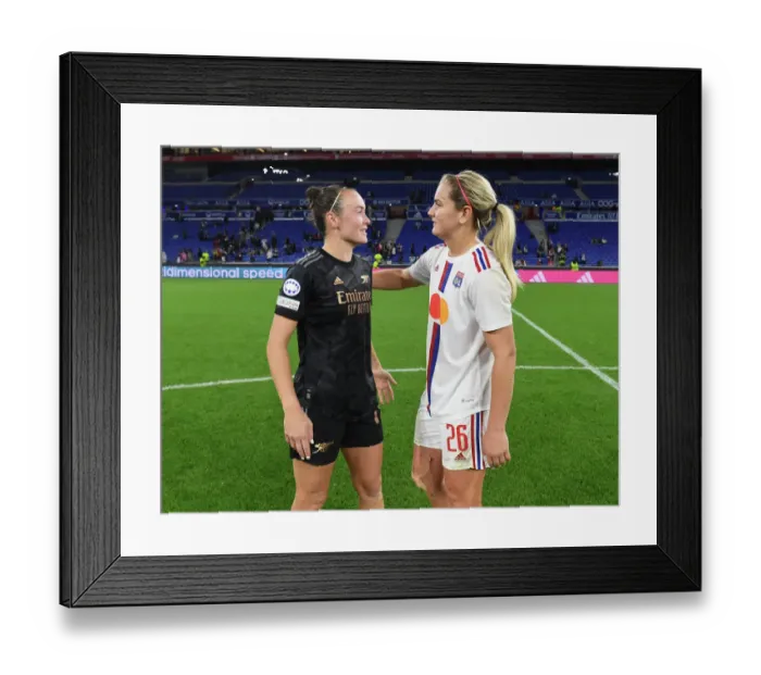 Framed Print : Champions Clash: Caitlin Foord and Lindsey Horan Face Off in Olympique Lyonnais vs. Arsenal Women's Champions League Match