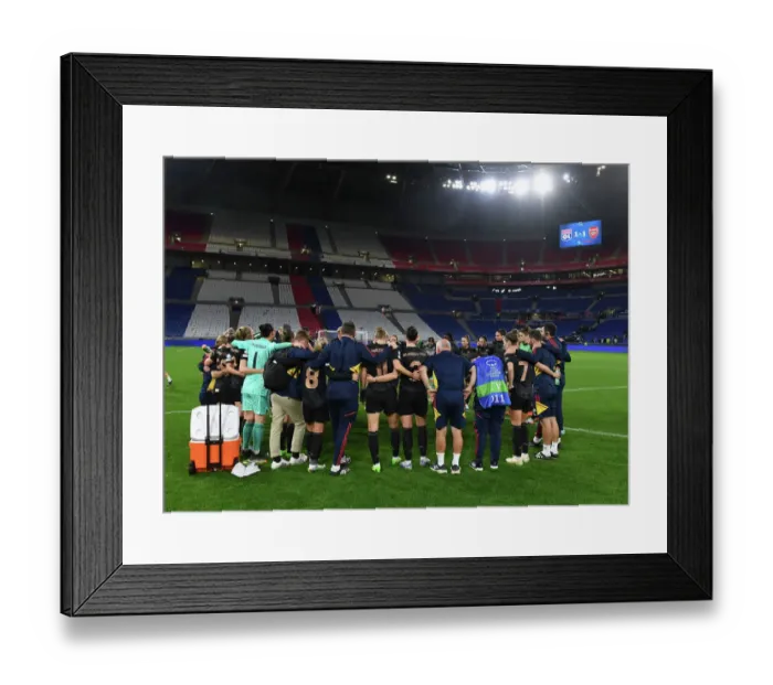Framed Print : Arsenal Women vs. Olympique Lyonnais: A UEFA Champions League Showdown at Groupama Stadium