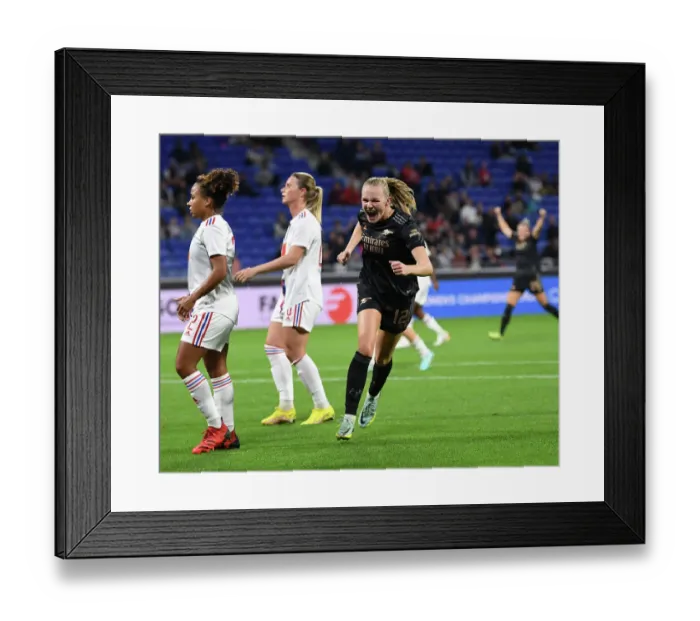 Framed Print : Arsenal Women's Victory: Frida Maanum Scores Second Goal Against Olympique Lyonnais in UEFA Womens Champions League