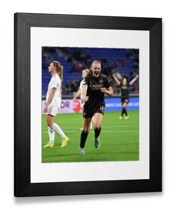 Framed Print : Frida Maanum Scores Arsenal's Second Goal in UEFA Women's Champions League Victory over Olympique Lyonnais (October 2022)