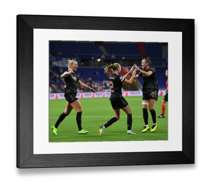 Framed Print : Arsenal Women's Double Strike: Celebrating Goals Against Olympique Lyonnais in UEFA Women's Champions League