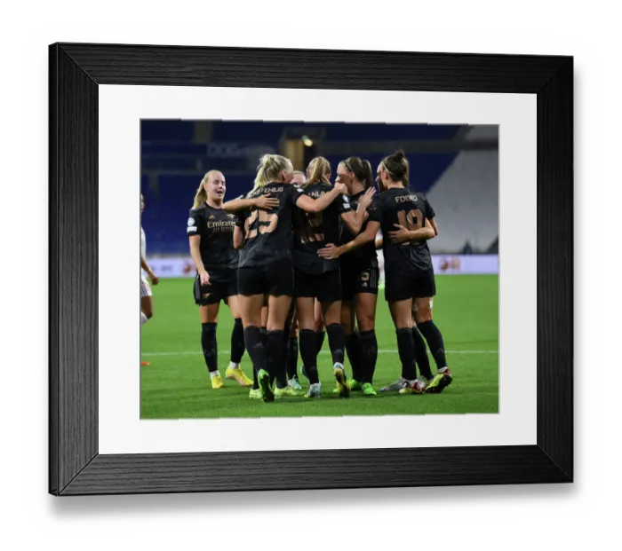 Framed Print : Arsenal Women's Team Triumphs with Two Goals Against Olympique Lyonnais in UEFA Womens Champions League