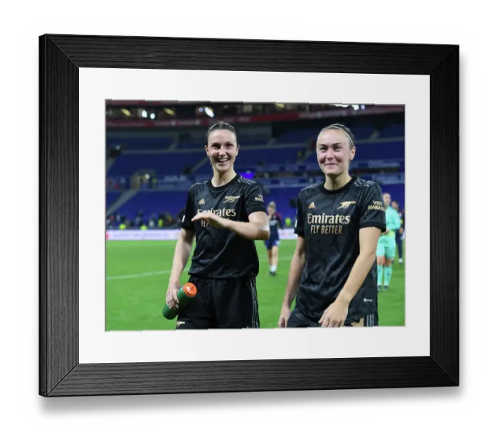 Framed Print : Champions League Showdown: Arsenal Women vs. Olympique Lyonnais - A Battle of Titans