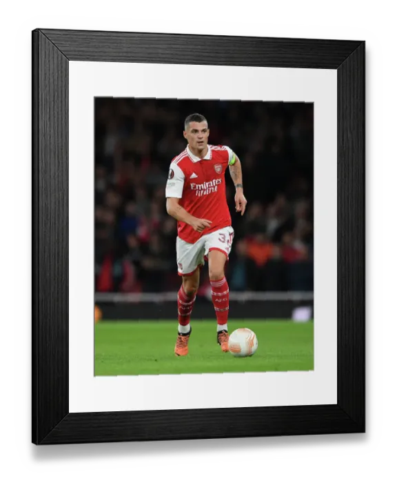 Framed Print : Granit Xhaka's Brilliant Performance: Arsenal Dominates PSV Eindhoven in Europa League