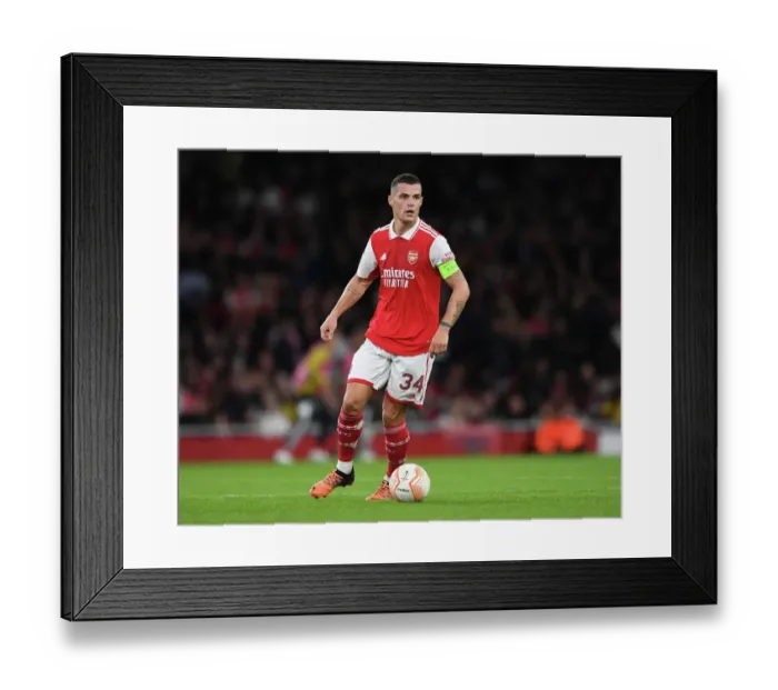 Framed Print : Granit Xhaka's Stellar Midfield Display: Arsenal Secures Europa League Victory vs. PSV Eindhoven