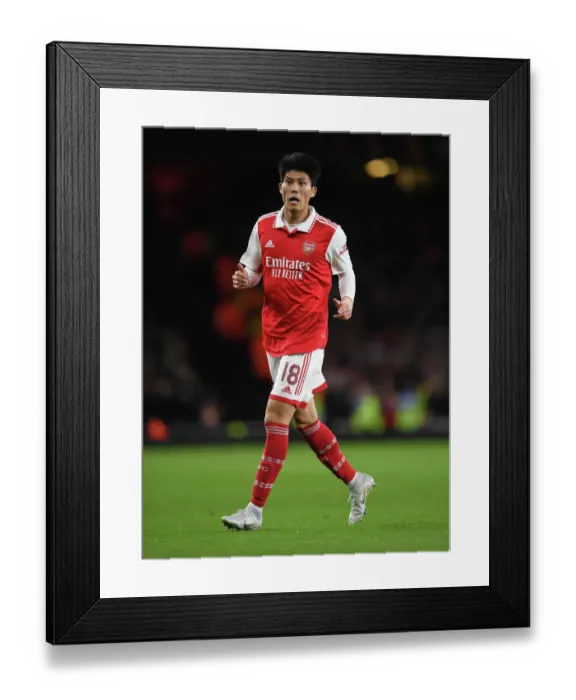 Framed Print : Arsenal's Tomiyasu Stands Out: Arsenal vs PSV Eindhoven, UEFA Europa League 2022-23