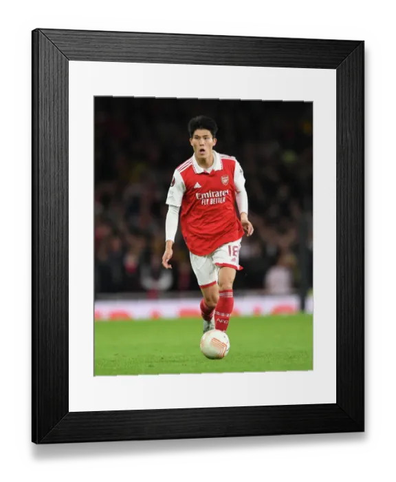 Framed Print : Arsenal's Tomiyasu Stars: Arsenal vs PSV Eindhoven, Europa League 2022-23