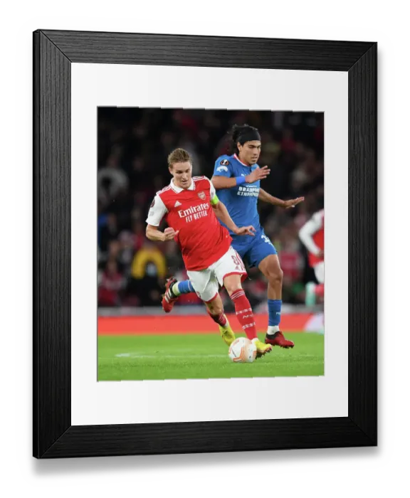 Framed Print : Arsenal vs PSV Eindhoven: Martin Odegaard Clashes with Erick Gutierrez in Europa League Showdown Framed Print : Arsenal vs PSV Eindhoven: Martin Odegaard Clashes with Erick Gutierrez in Europa League Showdown