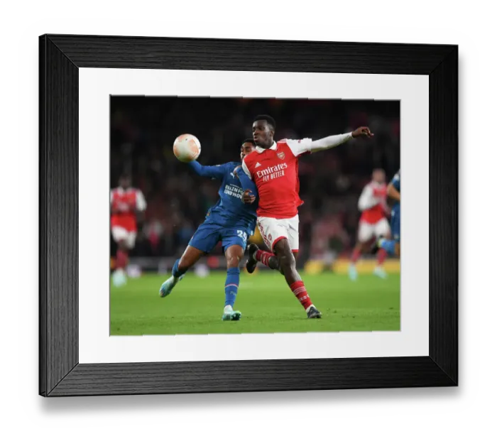 Framed Print : Arsenal vs PSV Eindhoven: Europa League Battle at Emirates Stadium