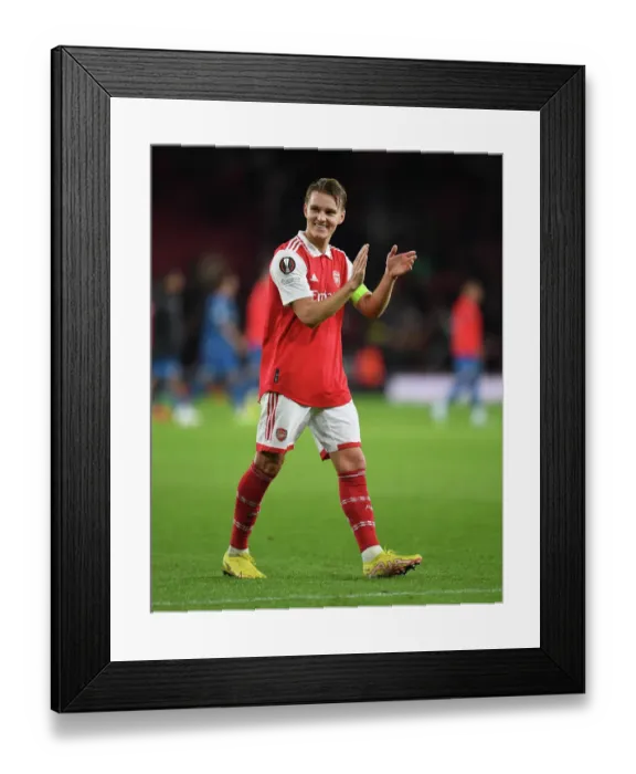 Framed Print : Martin Odegaard's Emotional Reaction: Arsenal's Europa League Clash vs. PSV Eindhoven (2022-23) Framed Print : Martin Odegaard's Emotional Reaction: Arsenal's Europa League Clash vs. PSV Eindhoven (2022-23)