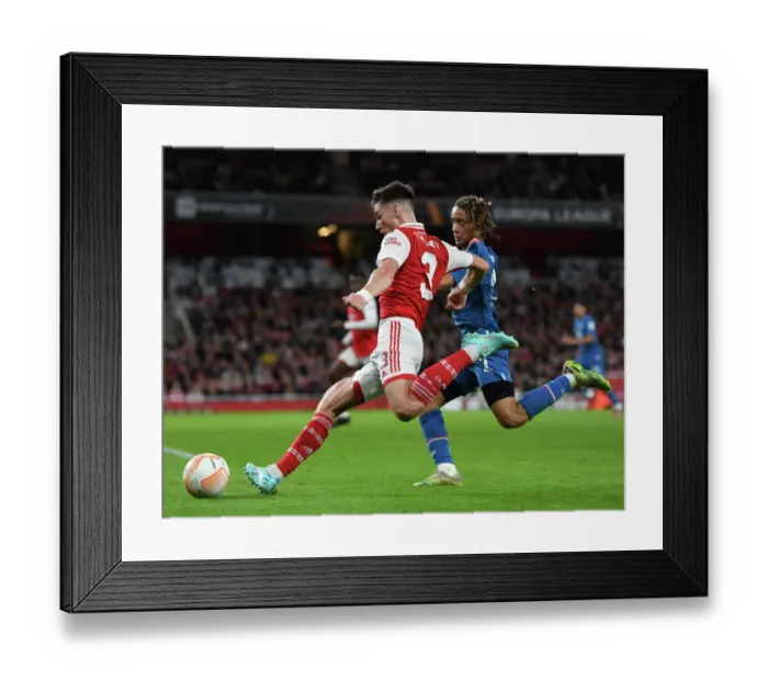 Framed Print : Arsenal vs PSV Eindhoven: Kieran Tierney Clashes with Xavi Simons in Europa League Showdown Framed Print : Arsenal vs PSV Eindhoven: Kieran Tierney Clashes with Xavi Simons in Europa League Showdown