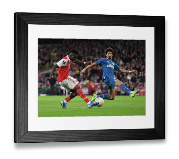 Framed Print : Arsenal's Bukayo Saka in Action against PSV Eindhoven in the 2022-23 Europa League Framed Print : Arsenal's Bukayo Saka in Action against PSV Eindhoven in the 2022-23 Europa League