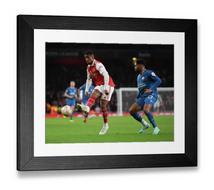 Framed Print : Arsenal vs PSV Eindhoven: Tight Battle in Europa League Group A