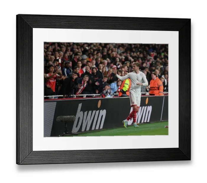 Framed Print : Arsenal's Rob Holding Celebrates after Winning against PSV Eindhoven in the Europa League Framed Print : Arsenal's Rob Holding Celebrates after Winning against PSV Eindhoven in the Europa League