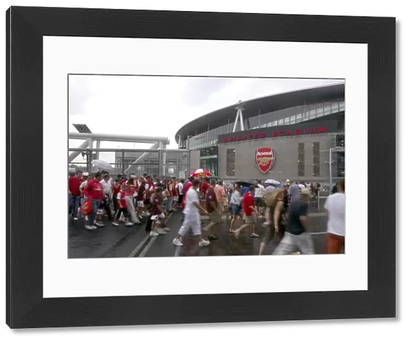 Arsenal fans cross the North Bridge to get to Emirates Stadium