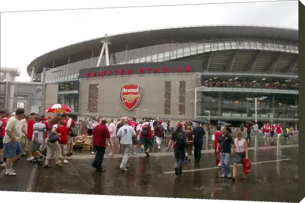 Arsenal fans gather outside the Emirates Stadium
