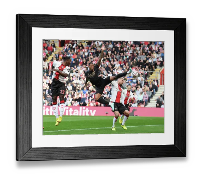 Framed Print : Arsenal's Gabreil Magalhaes Faces Off Against Southampton's Lyanco in Premier League Clash (2022-23)