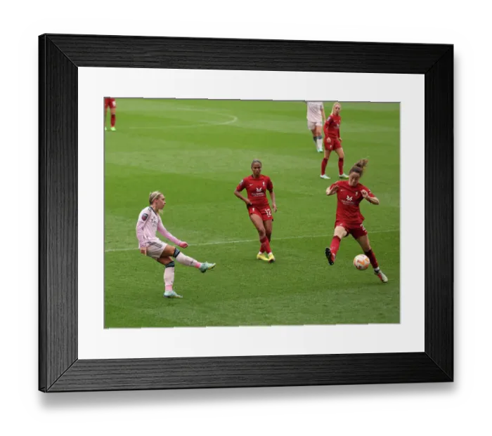 Framed Print : Arsenal vs. Liverpool: Nobbs Crosses Amid Intense Pressure in FA Womens Super League Clash Framed Print : Arsenal vs. Liverpool: Nobbs Crosses Amid Intense Pressure in FA Womens Super League Clash