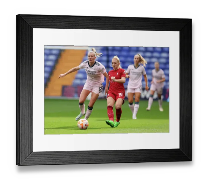 Framed Print : Arsenal's Frida Maanum Shuts Down Liverpool's Ceri Holland in Intense Women's Super League Clash