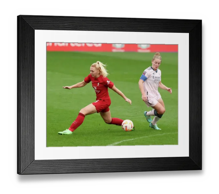 Framed Print : Arsenal's Kim Little Outsmarts Liverpool's Ceri Holland: A Pivotal Moment in the FA WSL Clash Framed Print : Arsenal's Kim Little Outsmarts Liverpool's Ceri Holland: A Pivotal Moment in the FA WSL Clash