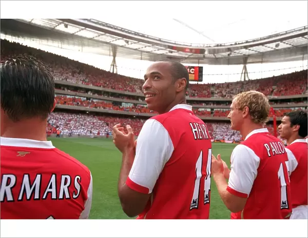Thierry Henry (Arsenal) line up with the Legends