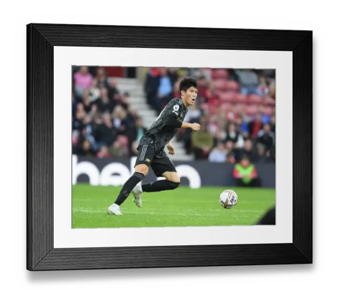 Framed Print : Arsenal's Tomiyasu in Action: Southampton vs. Arsenal, Premier League 2022-23