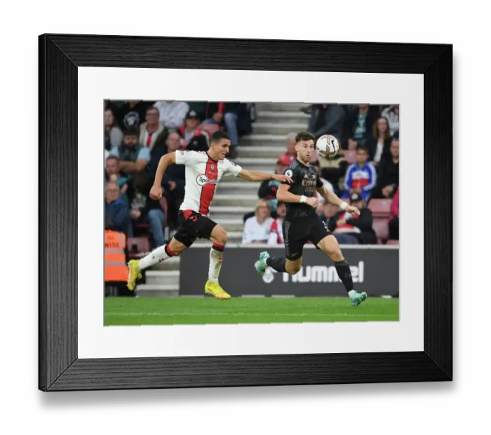 Framed Print : Intense Rivalry: Kieran Tierney vs. Mo Elyounoussi Battle in Southampton vs. Arsenal Premier League Clash Framed Print : Intense Rivalry: Kieran Tierney vs. Mo Elyounoussi Battle in Southampton vs. Arsenal Premier League Clash