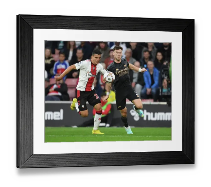 Framed Print : Arsenal's Kieran Tierney Clashes with Southampton's Mo Elyounoussi in Premier League Showdown Framed Print : Arsenal's Kieran Tierney Clashes with Southampton's Mo Elyounoussi in Premier League Showdown