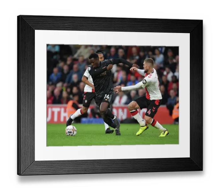 Framed Print : Arsenal's Eddie Nketiah Outwits Southampton's Lyanco: Premier League Thriller Framed Print : Arsenal's Eddie Nketiah Outwits Southampton's Lyanco: Premier League Thriller