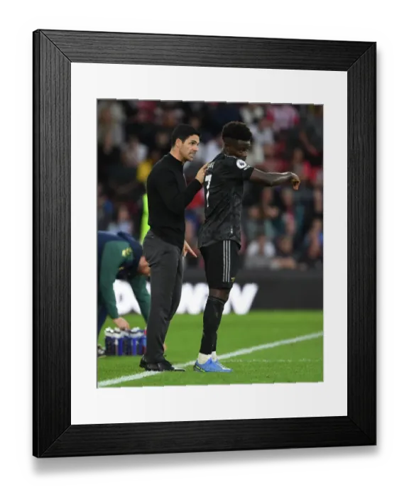 Framed Print : Arsenal's Mikel Arteta Coaches Bukayo Saka during Southampton Match, 2022-23 Premier League Framed Print : Arsenal's Mikel Arteta Coaches Bukayo Saka during Southampton Match, 2022-23 Premier League
