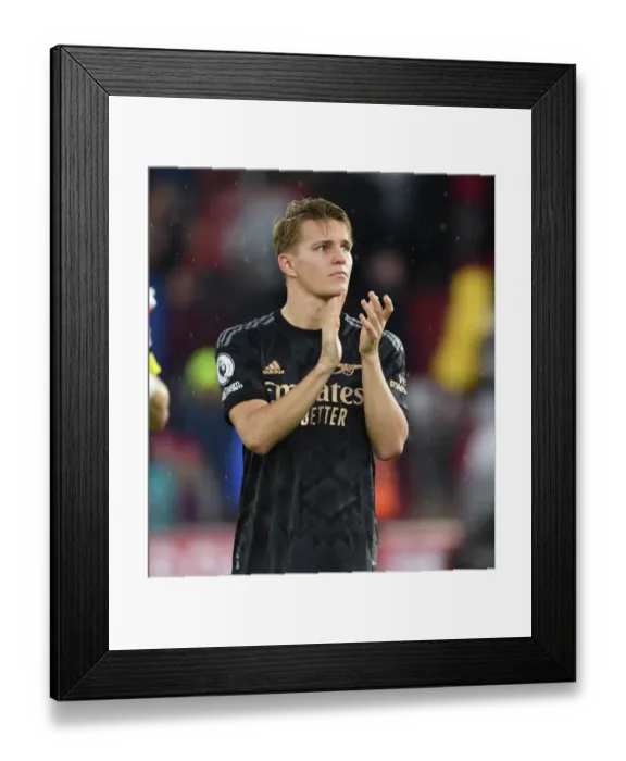 Framed Print : Martin Odegaard Celebrates with Arsenal Fans after Southampton Victory, 2022-23 Premier League Framed Print : Martin Odegaard Celebrates with Arsenal Fans after Southampton Victory, 2022-23 Premier League
