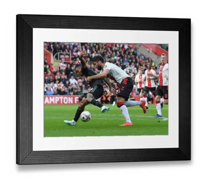 Framed Print : Clash at St. Mary's: Gabriel Jesus Tangles with Caleta-Car in Southampton vs Arsenal Premier League Showdown