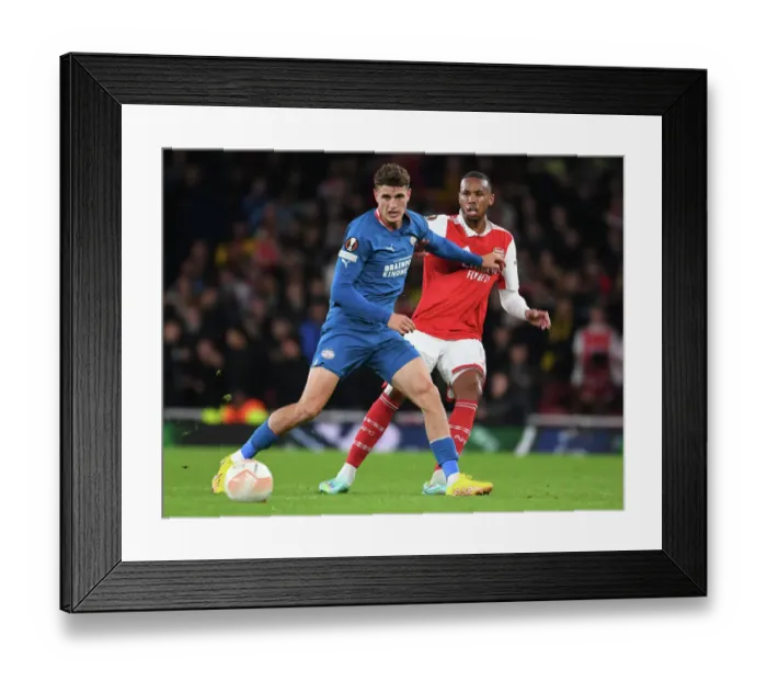 Framed Print : Arsenal vs PSV Eindhoven: Europa League Clash at Emirates Stadium Framed Print : Arsenal vs PSV Eindhoven: Europa League Clash at Emirates Stadium