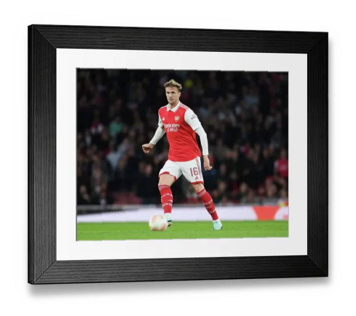 Framed Print : Arsenal vs PSV Eindhoven: Europa League Battle at Emirates Stadium
