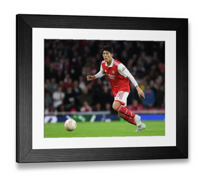 Framed Print : Arsenal's Tomiyasu Shines: Arsenal vs PSV Eindhoven, Europa League 2022-23