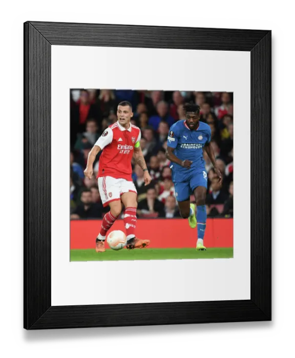 Framed Print : Granit Xhaka's Europa League Battle: Arsenal vs PSV Eindhaven