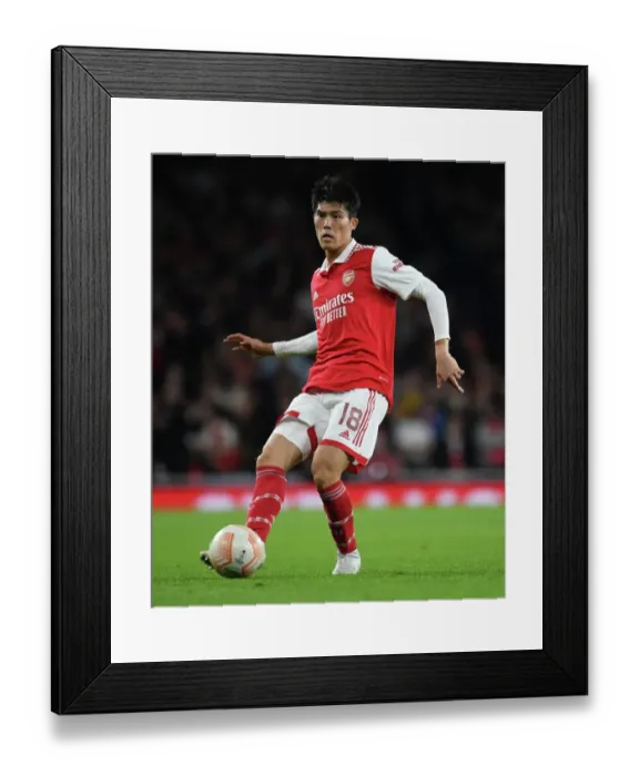 Framed Print : Arsenal vs PSV Eindhoven: Tomiyasu in Action - UEFA Europa League 2022-23 Framed Print : Arsenal vs PSV Eindhoven: Tomiyasu in Action - UEFA Europa League 2022-23